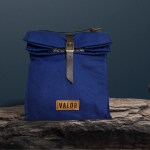 Blue canvas bag with leather strap and buckle