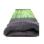 Folded grey bamboo socks with green label