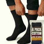 Person pulling up black loose top socks