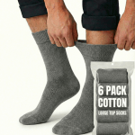 Person adjusting grey cotton crew socks