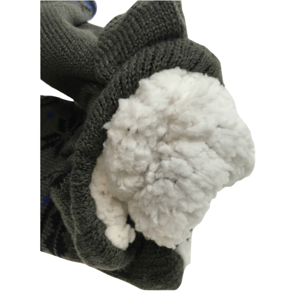 Gloved hand holding fluffy white cotton