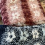 Close-up of patterned wool blankets with fluffy texture