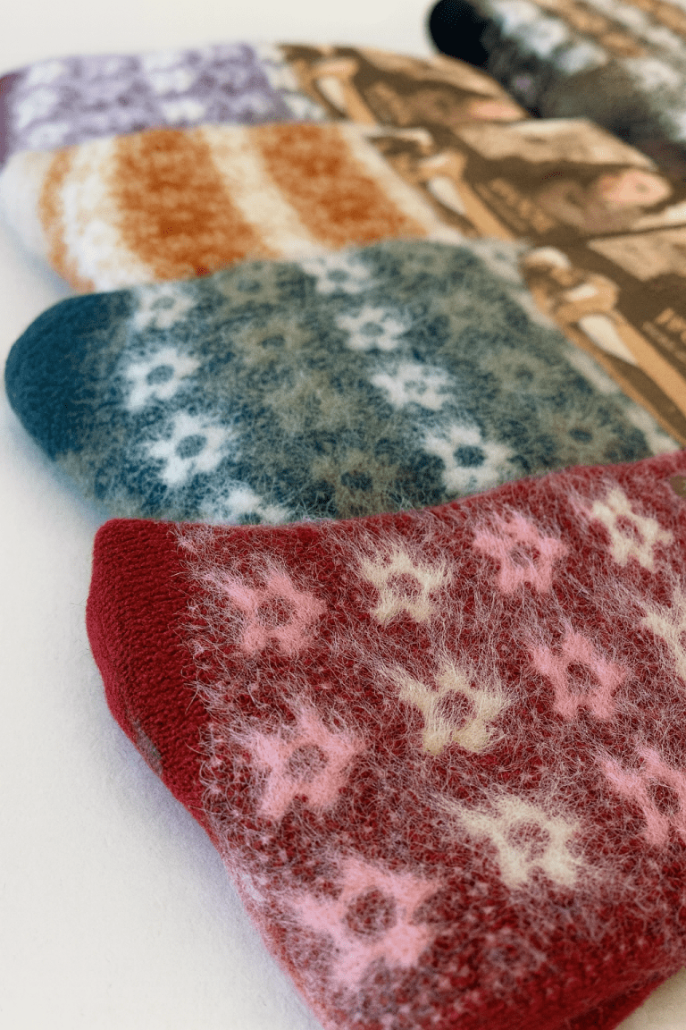Colourful fuzzy patterned socks lined up