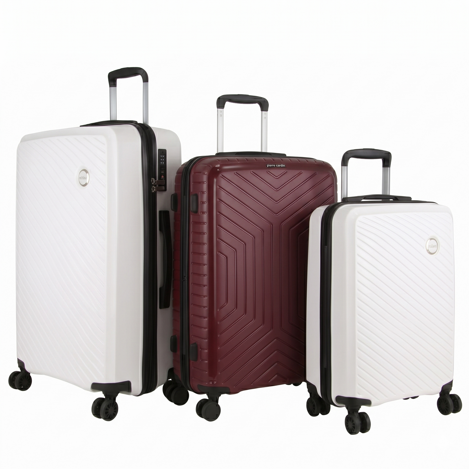 Three hard-shell suitcases with spinner wheels