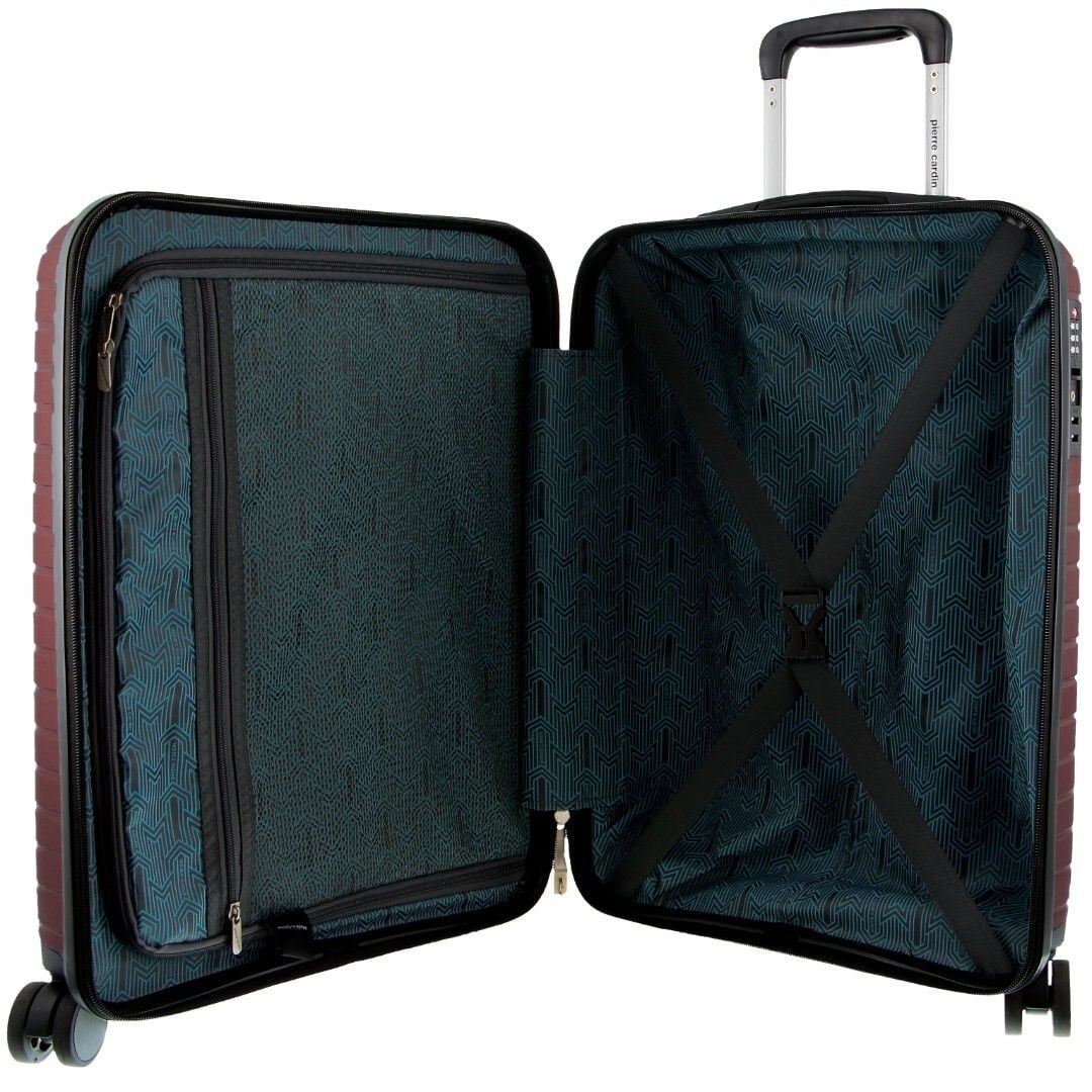 Open hard-shell suitcase with patterned interior compartments
