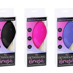 Three packaged detangling hair brushes in assorted colours