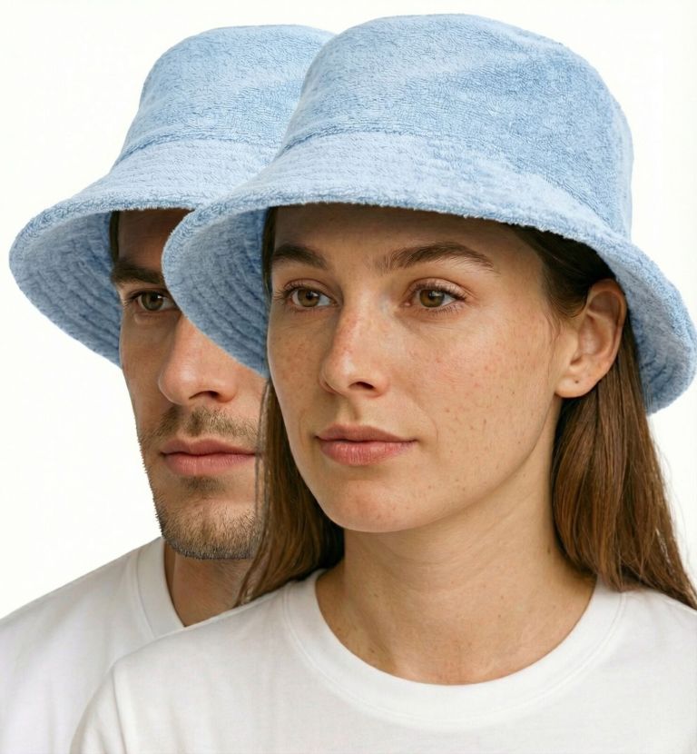Two people wearing light blue bucket hats