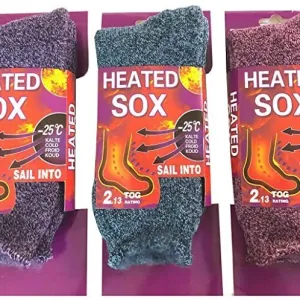 Three pairs of heated thermal socks in packaging