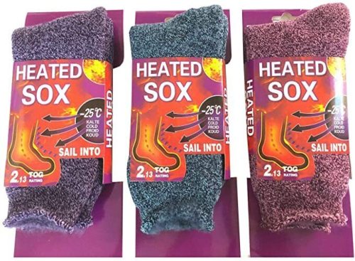 Three pairs of heated thermal socks in packaging