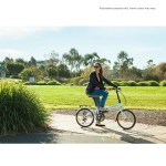 progear bikes nomad folding bike 20 in grey" Woman riding folding bike in sunny park