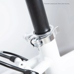 progear bikes nomad folding bike 20 in pearl white" Close-up of bicycle seatpost clamp on frame