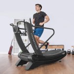 Man running on curved home treadmill