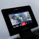 Treadmill screen displaying virtual outdoor running track