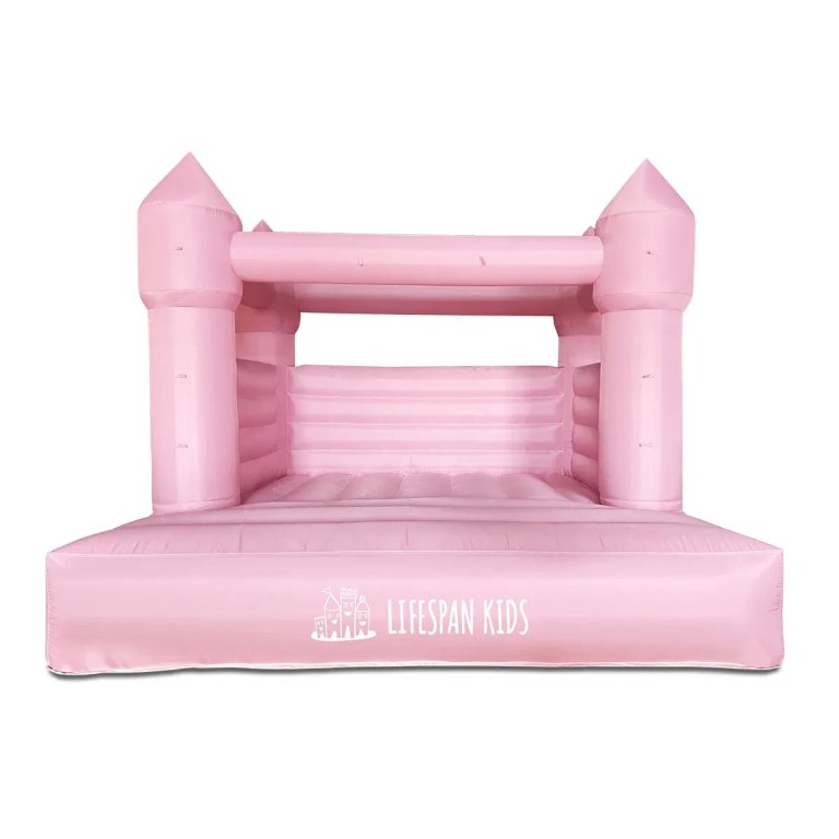 Pink inflatable kids jumping castle with turrets