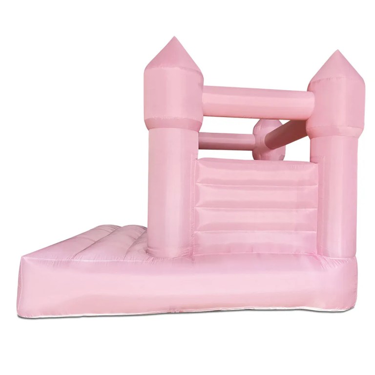 Pink inflatable jumping castle with slide entrance