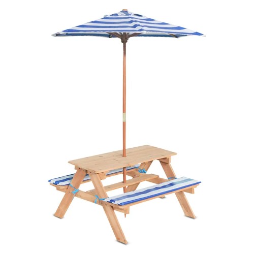 Wooden picnic table with striped umbrella and cushions
