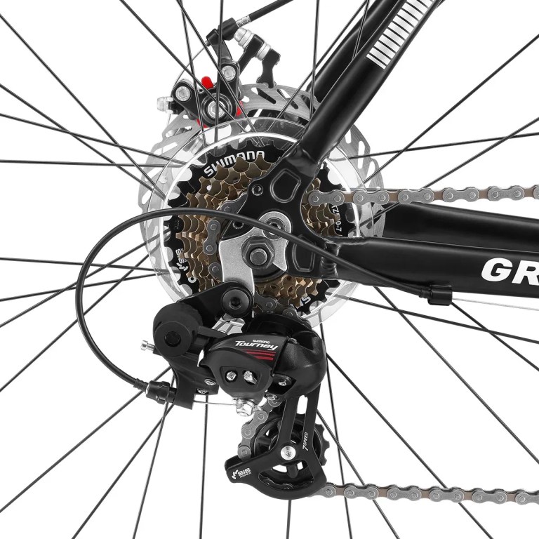 Shimano Tourney rear derailleur and cassette close-up