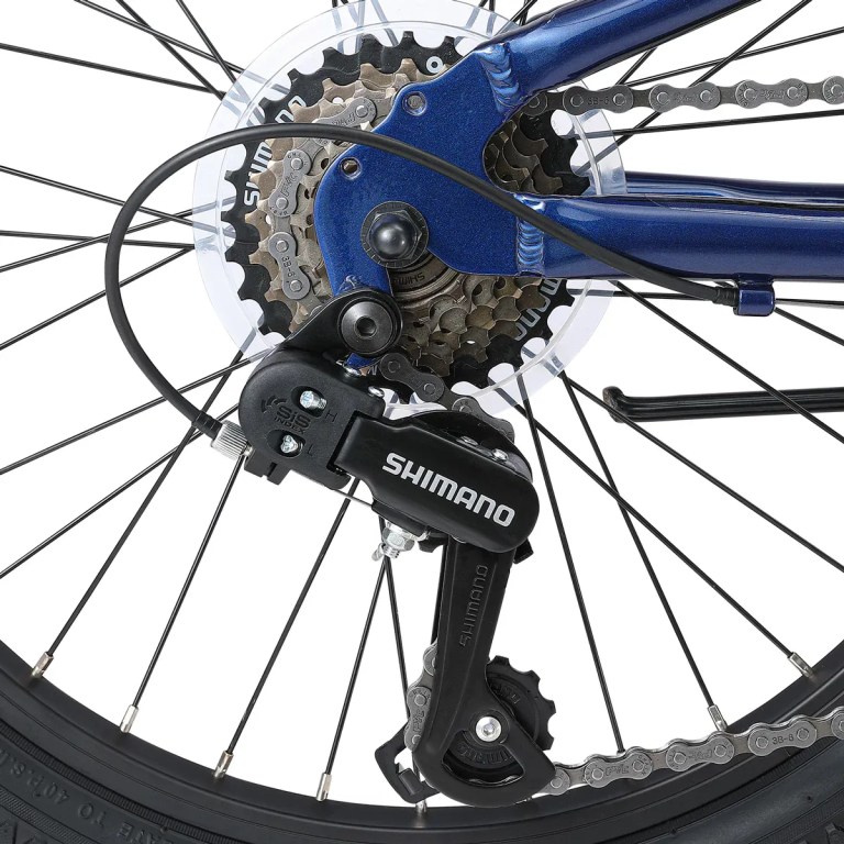 progear duralite 7 speed kids bike 20 royal blue" Close-up of Shimano rear bike derailleur and gears