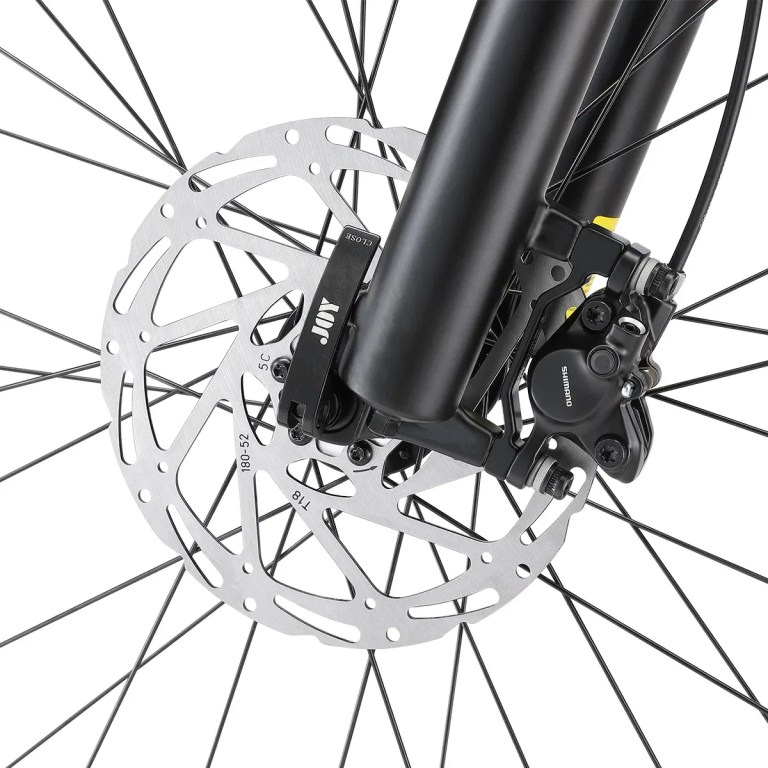 Close-up of bicycle disc brake and rotor