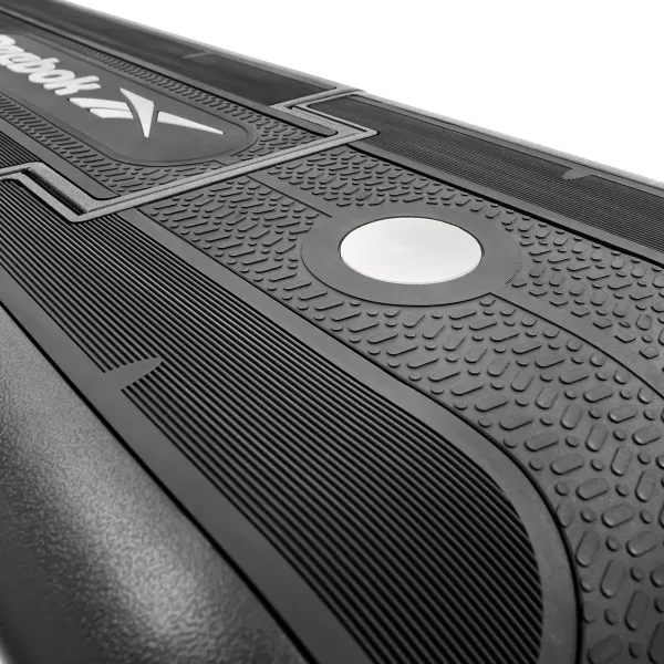 reebok deck white Close-up of textured treadmill running belt surface