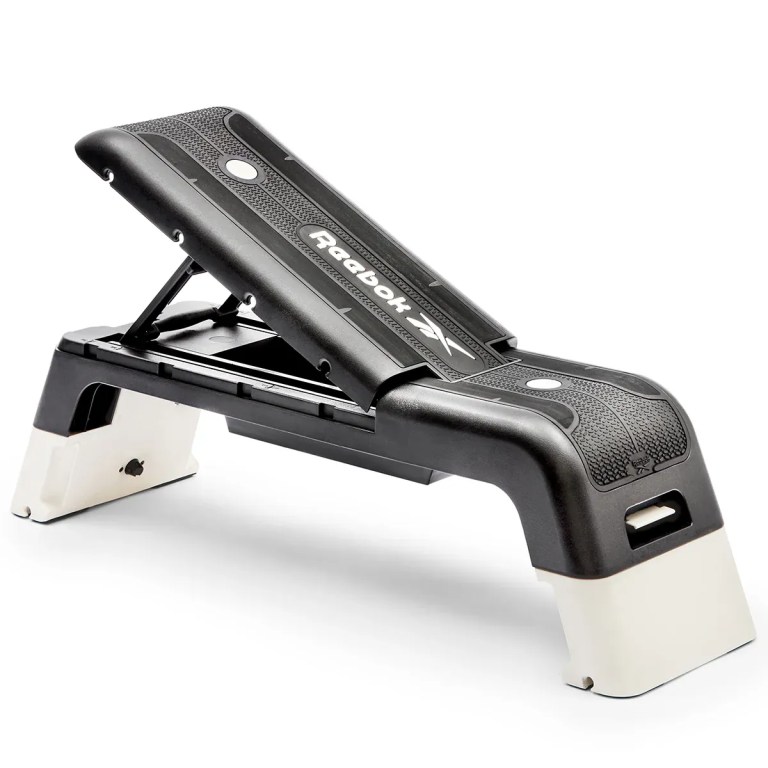 Adjustable Reebok aerobic step platform with risers