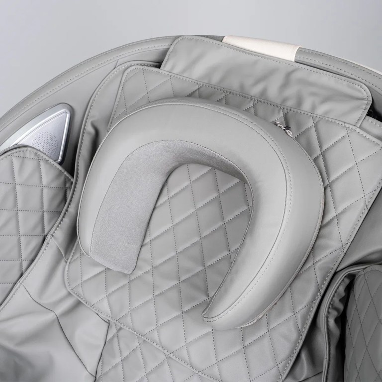 regen8 luxcloud air zero gravity heated massage chair Grey massage chair with quilted upholstery and headrest