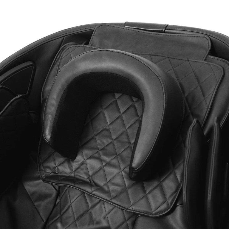 Black leather massage chair headrest and quilted padding