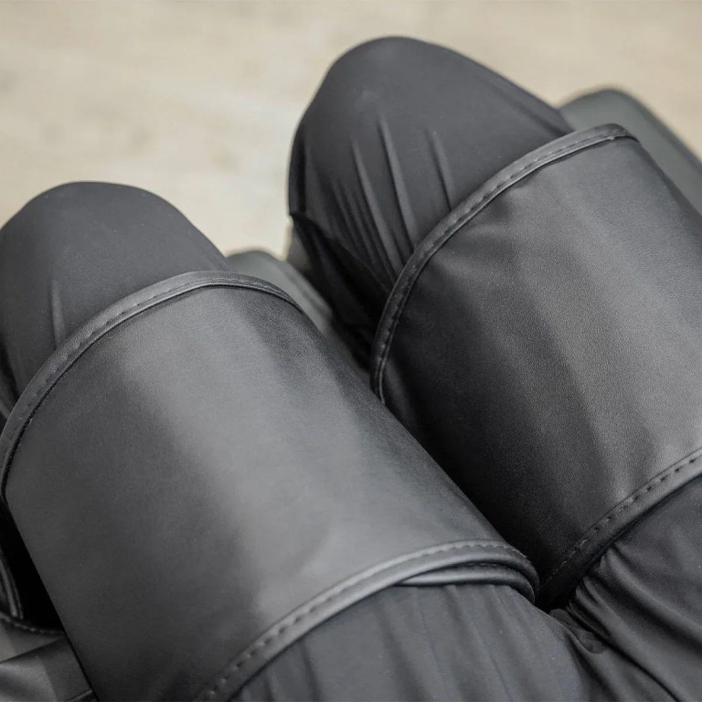 Close-up of black padded shin guards