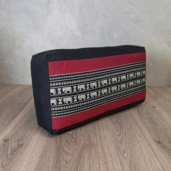 edf Rectangular elephant-patterned cushion on wooden floor