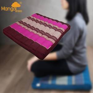 Pink and maroon patterned floor cushion
