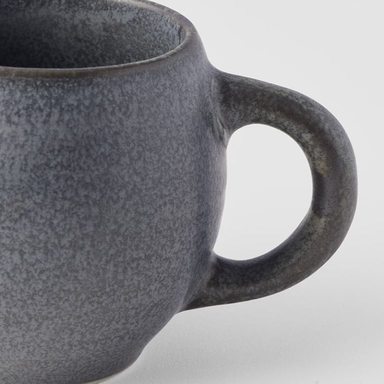 maru mug 300ml ash grey glaze Close-up of grey ceramic mug handle
