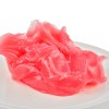 Bright pink slime on white plate