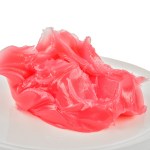 petroleum jelly pink 5 litre Bright pink slime on white plate