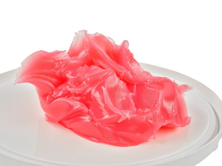 petroleum jelly pink 5 litre Bright pink slime on white plate