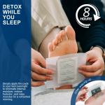 Person applying detox foot pad before sleep