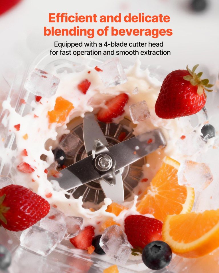 Blender blades mixing fruit, ice and milk