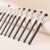 34 piece makeup brush set, professional brushes kit for foundation blending eyeshadow concealer blush with soft bristles, ergonomic wood handle, travel friendly case included Set of professional makeup brushes on beige background