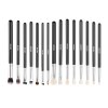 Set of black-handled makeup brushes on white