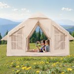 Couple relaxing in canvas tent with mountain view