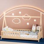 Wooden house-frame kids bed with glowing wall lights