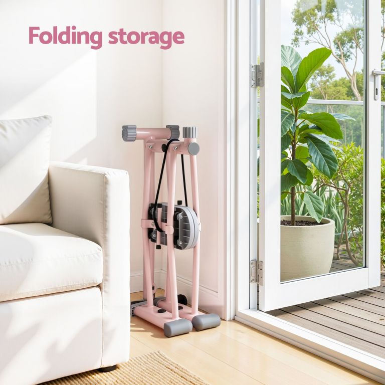 everfit foldable ski exercise machine leg thigh trainer home fitness cardio pink Folded pink exercise machine stored beside sofa