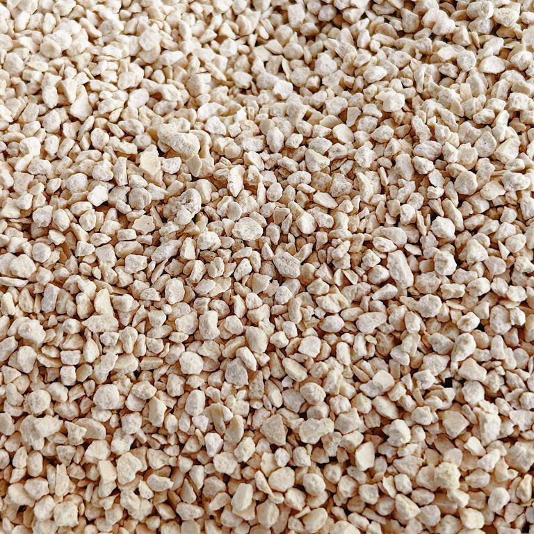 purrhaven bamboo clumping cat & kitty litter, 7.5kg (3 pack),dust free,natural flusable,easy to clean,odour neutraliser,rapid liquid absorption,non toxic formula Close-up of small white gravel stones