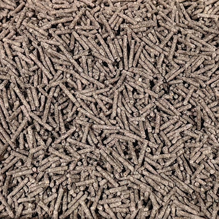 Close-up of brown wood pellets texture
