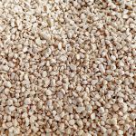 purrhaven tapioca clumping cat & kitty litter, 7.5kg (3 pack),dust free,easy to clean,odour neutraliser,rapid liquid absorption,non toxic formula Close-up of small white gravel stones