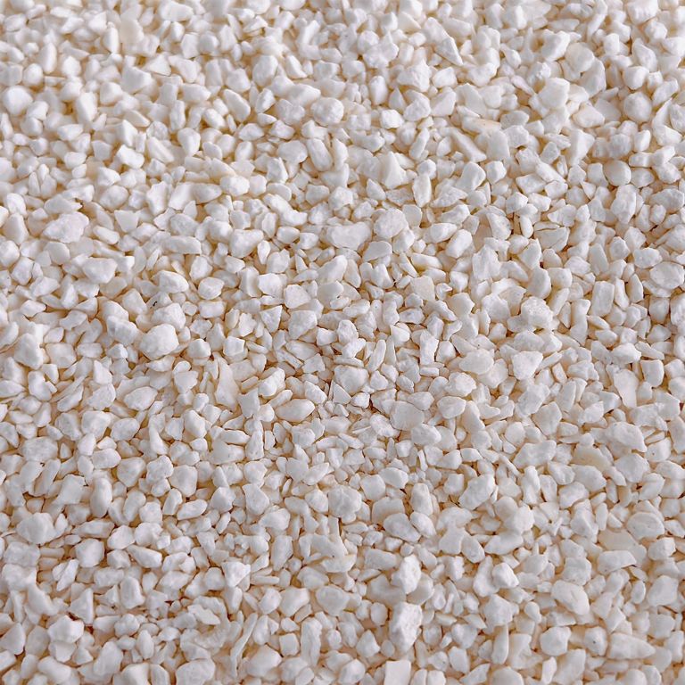 purrhaven tapioca clumping cat & kitty litter, 7.5kg (3 pack),dust free,easy to clean,odour neutraliser,rapid liquid absorption,non toxic formula Close-up of small white decorative gravel stones
