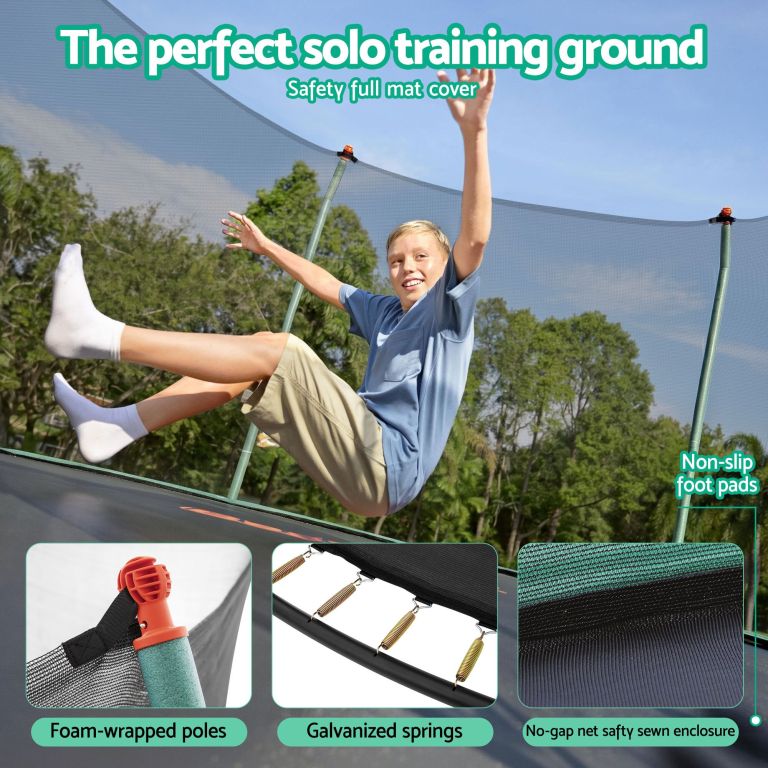 bestway 14ft trampoline kids rebounder safety net enclosure outdoor fitness 4.27m for ages 6+ Boy jumping on backyard trampoline with safety net