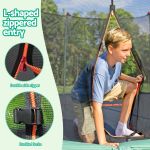 bestway 14ft trampoline kids rebounder safety net enclosure outdoor fitness 4.27m for ages 6+ Boy entering trampoline with L-shaped zippered enclosure