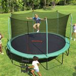 bestway 14ft trampoline kids rebounder safety net enclosure outdoor fitness 4.27m for ages 6+ Kids playing on backyard trampoline with safety net