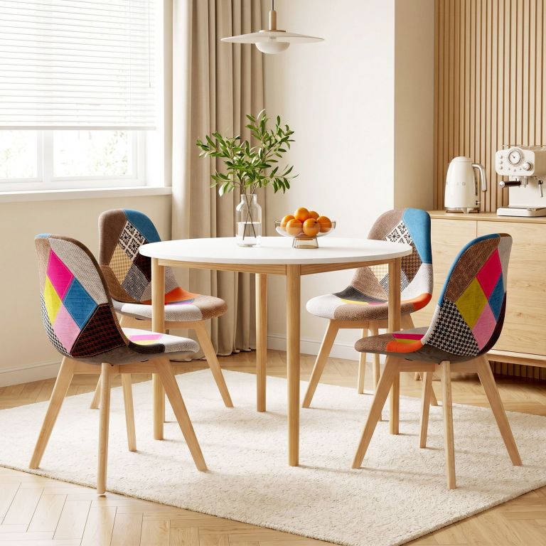 Modern dining area with colourful patchwork chairs
