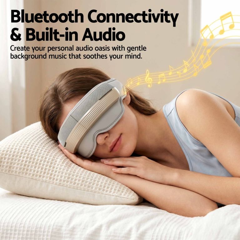 livemor eye and head massager with heat, eye massager, forehand and temple massager, air compression & bluetooth music, 5 modes, 180° foldable, relaxation gifts for mom dad women men Woman wearing Bluetooth eye massager with audio